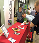 Visitors at the SAIMC stand.